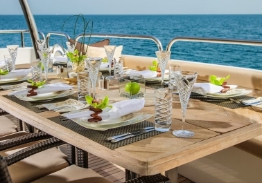 Culinary Delights at Sea: Indulge in Gourmet Dining Aboard Our Yachts Image